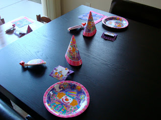 Birthday Party Plates and hats on table