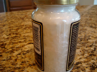 Side of jar of coconut oil