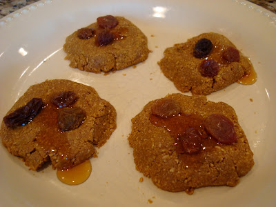 Four No-Bake Vegan Maple Flaxseed Cookies on white plate
