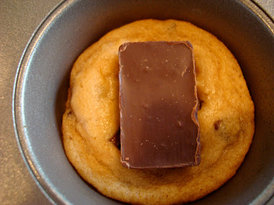 Peanut Butter Cup Chocolate Chip Cookie in muffin tin