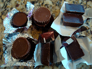 Unwrapped dark chocolate and peanut butter cups