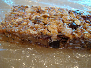 Close up of cut No Bake Vegan PB Choc Chip Coconut Oil Protein Bar