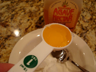 Agave nectar in measuring spoon