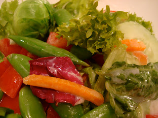 Overhead of dressed salad in bowl