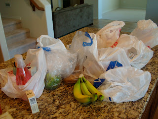 Various plastic grocery bags on countertop