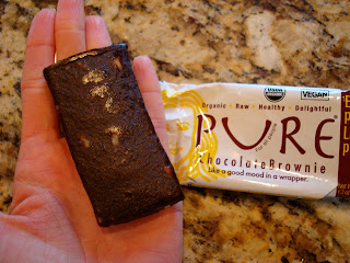 Hand holding a Pure Chocolate Brownie Bar - 15