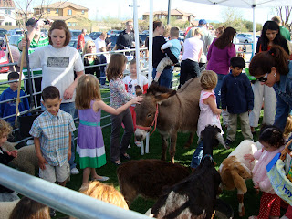 Crowd of children at petting zoo - 21