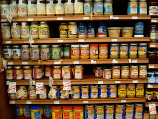 Shelves full of various nut butters - 33