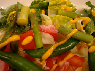Mixed vegetables topped with yellow mustard