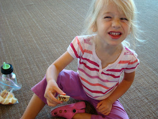 Young girl sitting on floor smiling - 13
