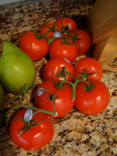 Tomatoes on vine - 27