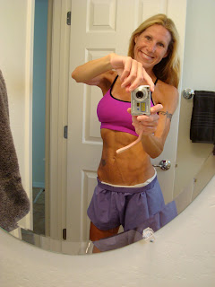 Woman in mirror with workout attire on