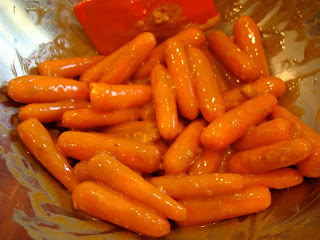 Stirred and glazed baby carrots