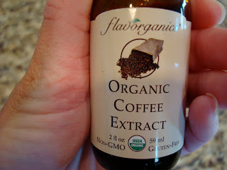 Hand holding Organic Coffee Extract