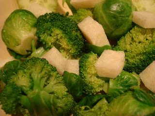 Broccoli with greens, jicama and Brussel sprouts in bowl - 3