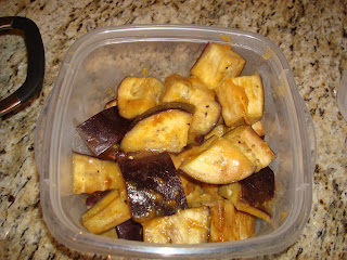 Cool eggplant salad in clear plastic container