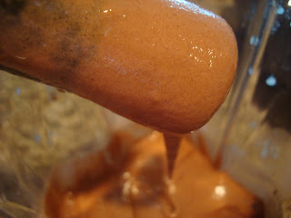 Tamper stick holding up some of the ice cream - 19