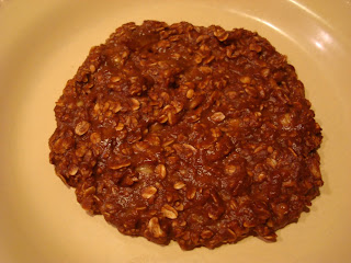 Chocolate Oat Breakfast Cookie on white plate taken out of refrigerator