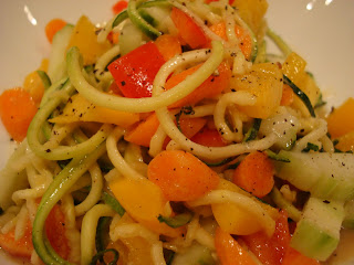 Close up of Zucchini Noodles, Vegetables and Peanut Sauce