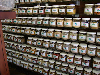 Shelves filled with containers of Chinese herbs - 7