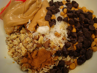 Ingredients in bowl needed to make Vegan Maple Nut Chocolate Oat Clusters