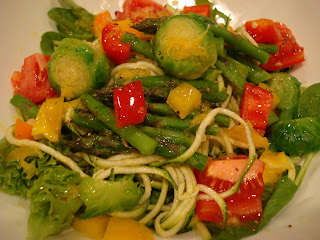 Spiralized zucchini noodles topped with mixed vegetables and dressing - 13
