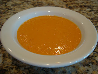 Red Pepper and Nooch Dipping Sauce in white round bowl