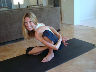 Woman doing Marichyasana D yoga pose