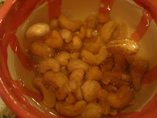Cashews soaking in bowl of water