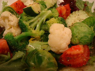 Mixed greens with vegetables in dressing