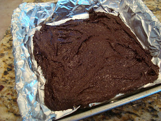 Thin Mint Fudge spread into foil lined pan