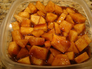 Apple mixture poured over crust in container