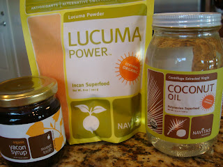 Close up of Yacon syrup, lucama powder, and coconut oil on countertop - 23