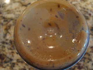 Bottom side of jar of nut butter