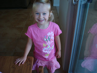 Smiling young girl wearing all pink