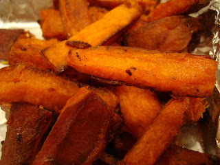 Close up of Sweet Potato Fries in foil lined pan