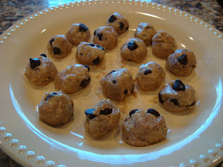 Dough rolled into individual balls on white plate