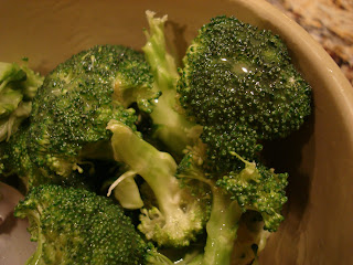 Glazed broccoli in brown bowl
