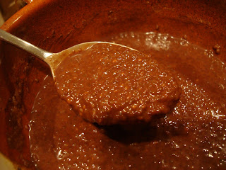 Spoon lifting up Raw Vegan Chocolate Chia Seed Pudding out of bowl - 15