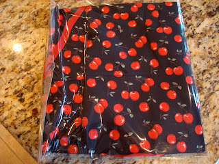 Black and cherry print apron in packaging - 15