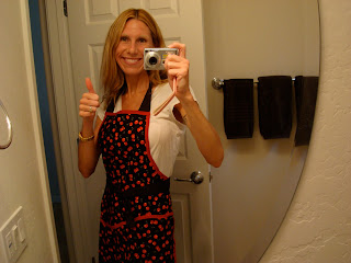 Lady wearing apron giving a thumbs up - 19