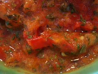 Up close of marinara sauce showing some chunks