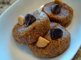 Three Raw Vegan Almond Butter Cookie Balls on white dish - 63