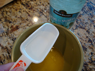 Measuring spoon adding Creme de Menthe to melted butter