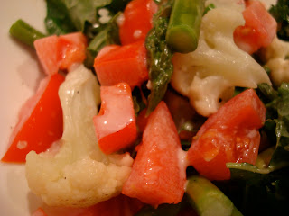 Mixed vegetables on top of salad