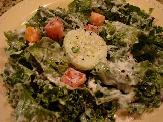 Kale Salad with a my Vegan Cesar-Inspired Dressing on white plate