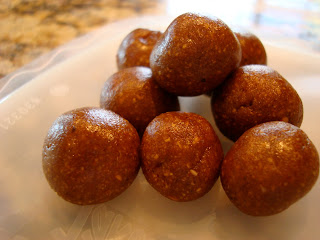 Raw Vegan Gingerbread Cookie Dough Balls stacked on one another
