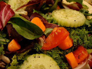 Close up of Mixed green salad with vegetables 