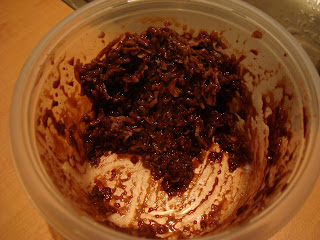 Vegan Chocolate Coconut Snowball mixture in clear container