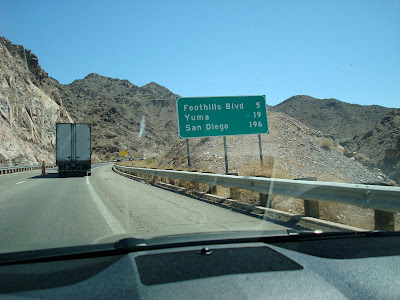 Road sign that says San Diego 196 Miles - 11